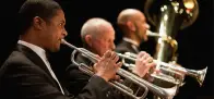 Men playing wind instruments